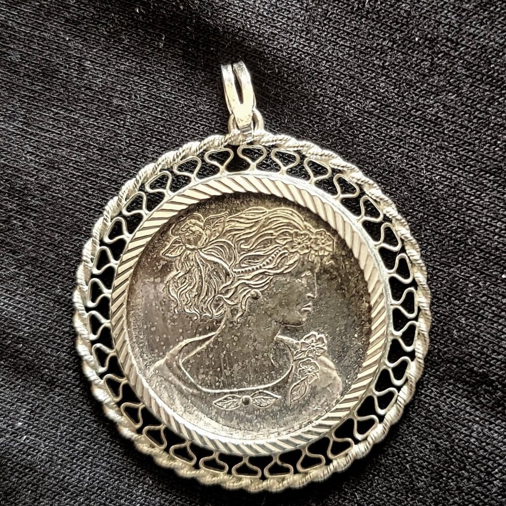 1/4 Ounce .999 Fine Silver Coin Pendant with Intricate Filigree Frame